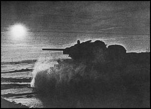 An early T-34 advancing in the snow