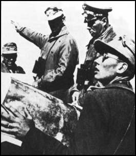 Rommel and his staff discussing operations