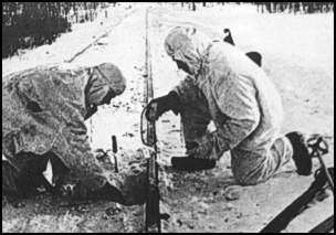 Soviet troops destroy a rail line behind German lines