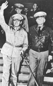 MacArthur (right) arrives in Australia