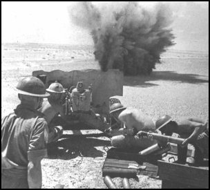 British 8th Army anti-tank gun under fire at El Alamein